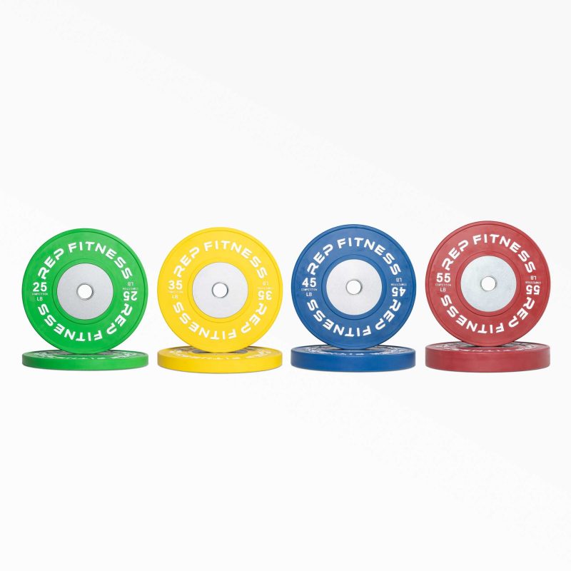 Full set of Competition Bumper Plate (LB) Pairs: green 25, yellow 35, blue 45, and red 55lb pairs.