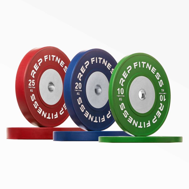 Set of Competition Bumper Plate (KG) Pairs: red 25, blue 20, and green 10kg pairs.