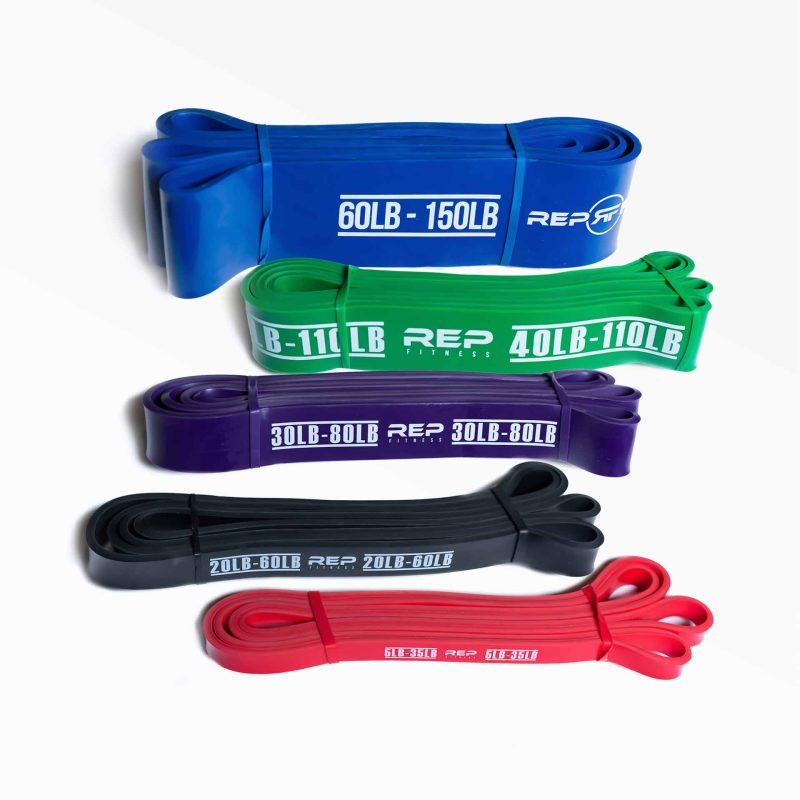 Set of REP resistance bands: xx-light red, x-light black, light purple, medium green, and heavy blue.